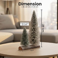 GoHooked snow-flocked mini Christmas trees with warm LED lights on a wooden base. Set of 2 tabletop pine trees.