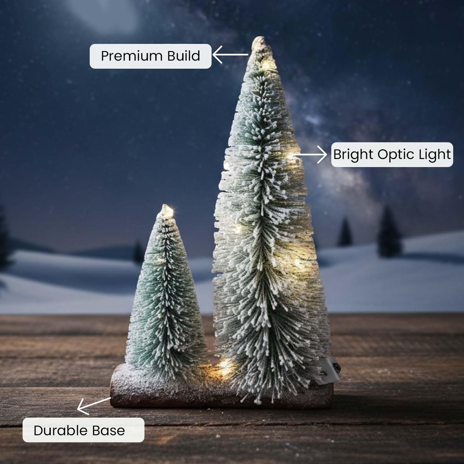 GoHooked snow-flocked mini Christmas trees with warm LED lights on a wooden base, perfect for tabletop decor.