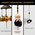 GoHooked brown metal Feng Shui monk figurine wind chime with brass bells, symbolizing peace and positive energy.