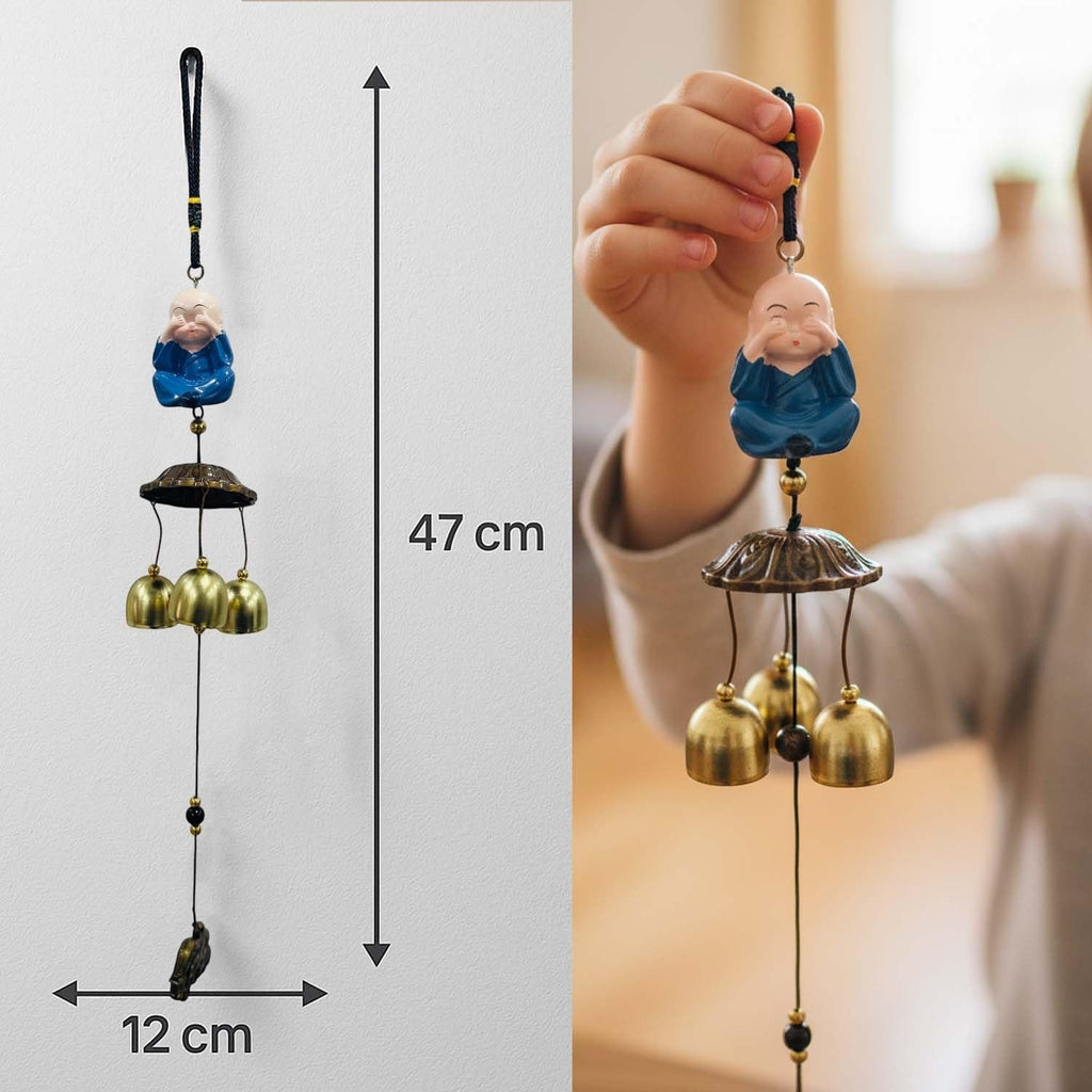 Go Hooked light blue monk figurine wind chime with 3 brass bells, 47cm long, for positive energy and home decor.