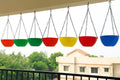 GoHooked multicolor plastic hanging triangle planters with chains, ideal for indoor/outdoor garden use.