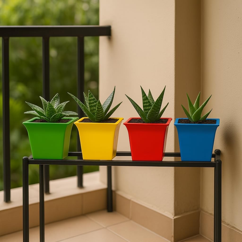 GoHooked set of 2 multicolor plastic planter pots with succulents on a balcony stand. Features green, yellow, red, and blue pots.