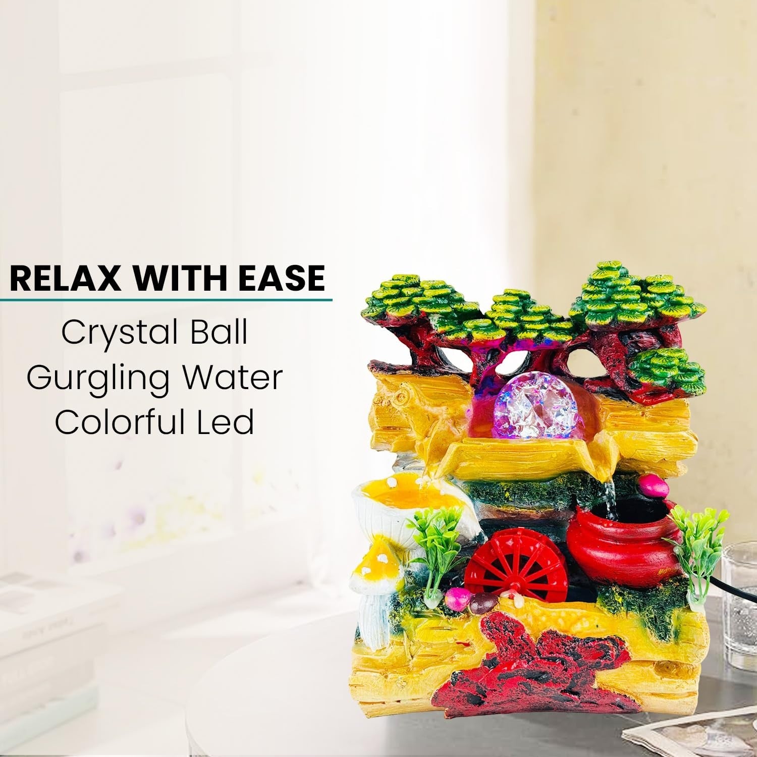 GoHooked multicolor polyresin tabletop waterfall fountain with crystal ball and colorful LED lights, adjustable speed.
