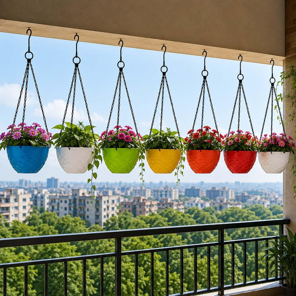 GoHooked set of 7 multicolored faceted plastic hanging planters with chains displayed on a sunny balcony railing.