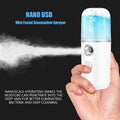 GoHooked white nano mist facial atomizer sprayer with blue water reservoir, emitting a fine mist.