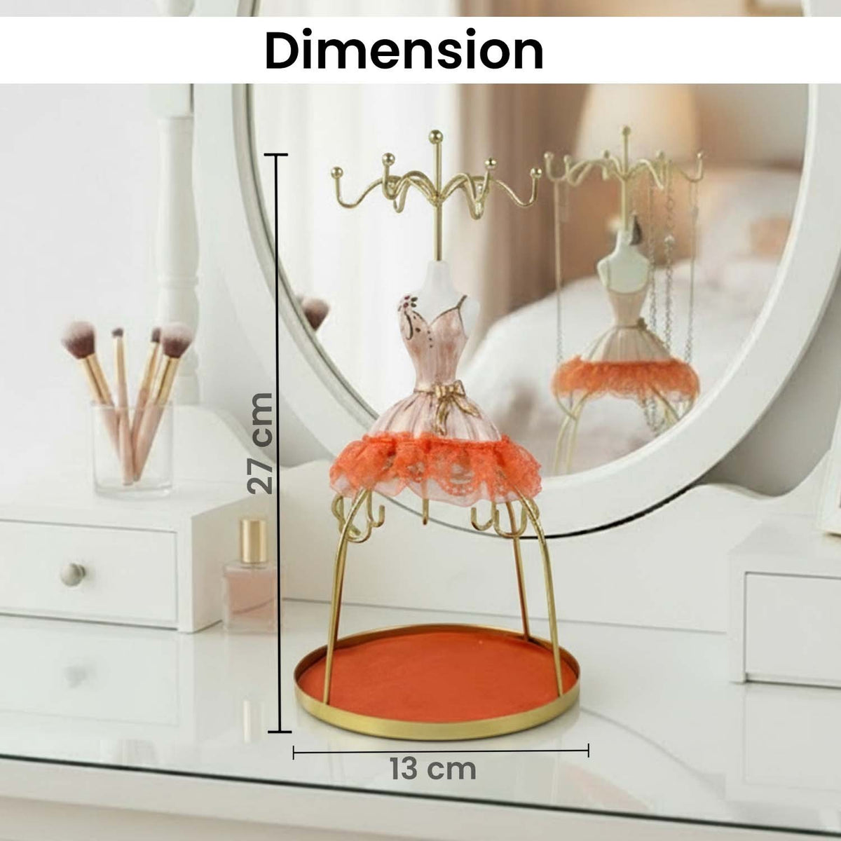 GoHooked orange doll dress jewelry stand with metal hooks and base tray for necklaces and rings on a vanity table