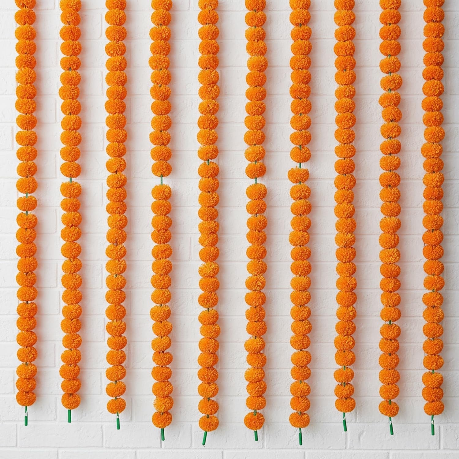 GoHooked orange artificial marigold flower garlands, 5 feet long, pack of 10, for festive and home decor.