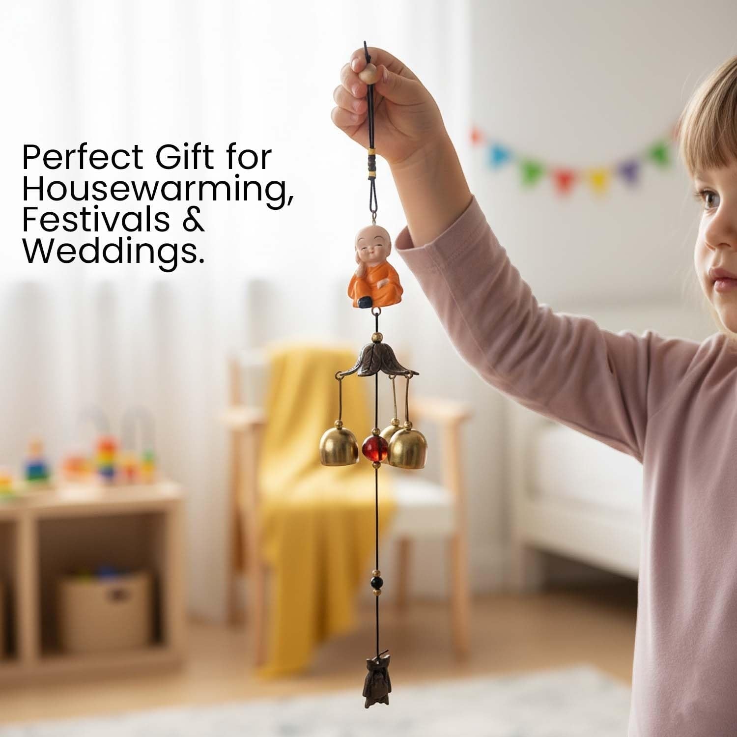 GoHooked orange monk figurine wind chime with brass bells, metal, for positive energy and home decor.