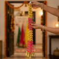GoHooked Orange-Pink artificial pom pom door hanging latkan with golden bells and beads, set of 4.
