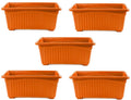 Go Hooked orange rectangular plastic plant pots, set of 5, with ribbed texture and raised feet.