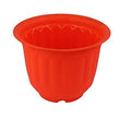 GoHooked orange plastic jasmine planter pot, 20.5x15 cm, fluted design, ideal for indoor and outdoor use.