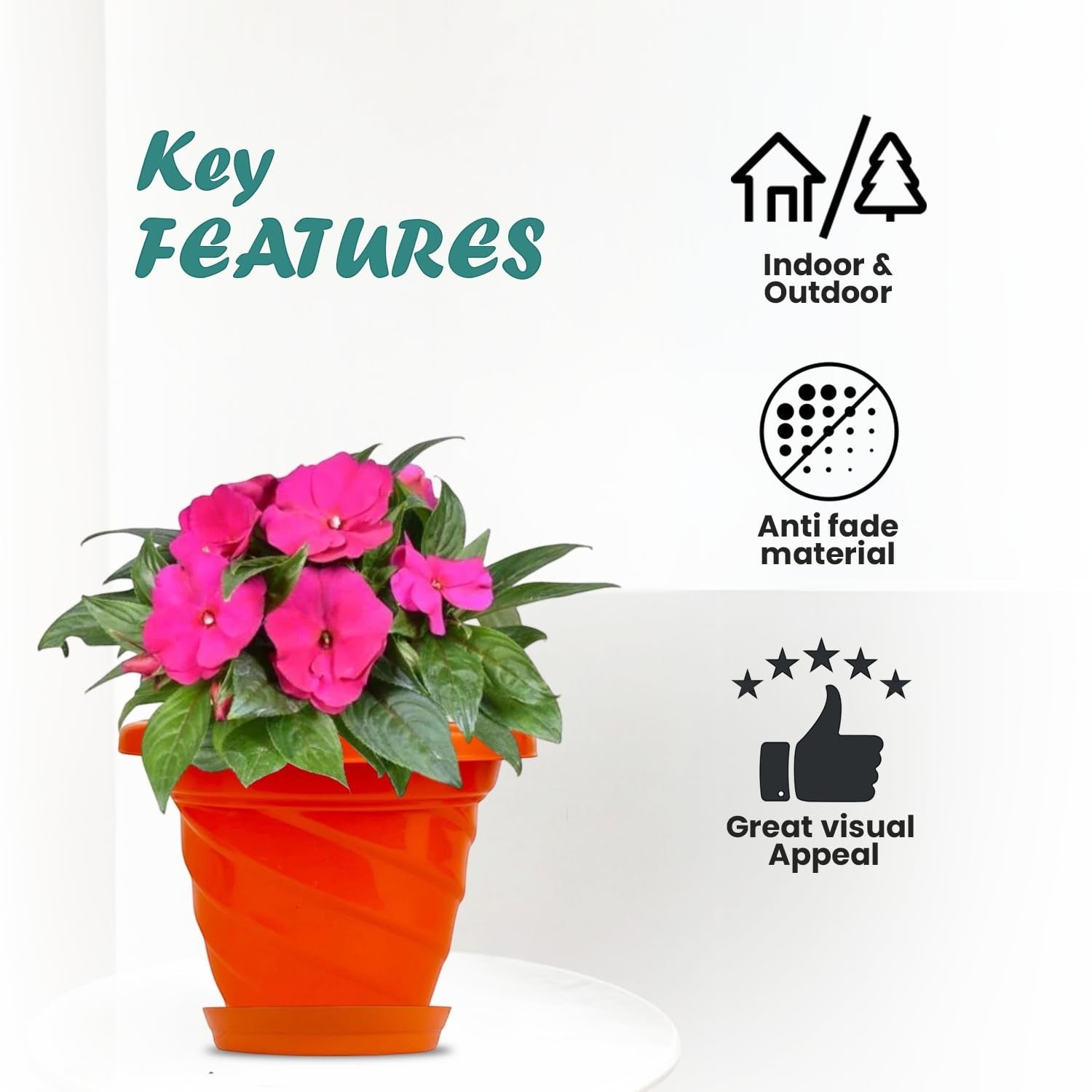 GoHooked orange plastic planter pot with saucer, featuring a modern twister design and pink flowers. Suitable for indoor/outdoor use.