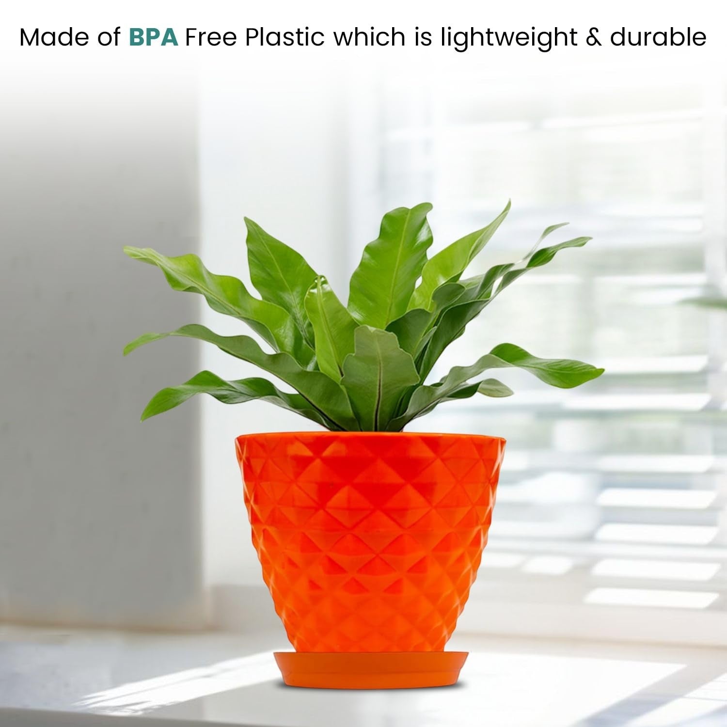 GoHooked orange diamond-patterned plastic planter pot with saucer, ideal for indoor/outdoor plants.