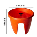 Go Hooked orange plastic 12-inch railing planter pot, lightweight and durable, perfect for balconies.
