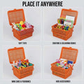 GoHooked orange plastic picnic storage basket with lid and handle, shown filled with toys, art supplies, and essentials.