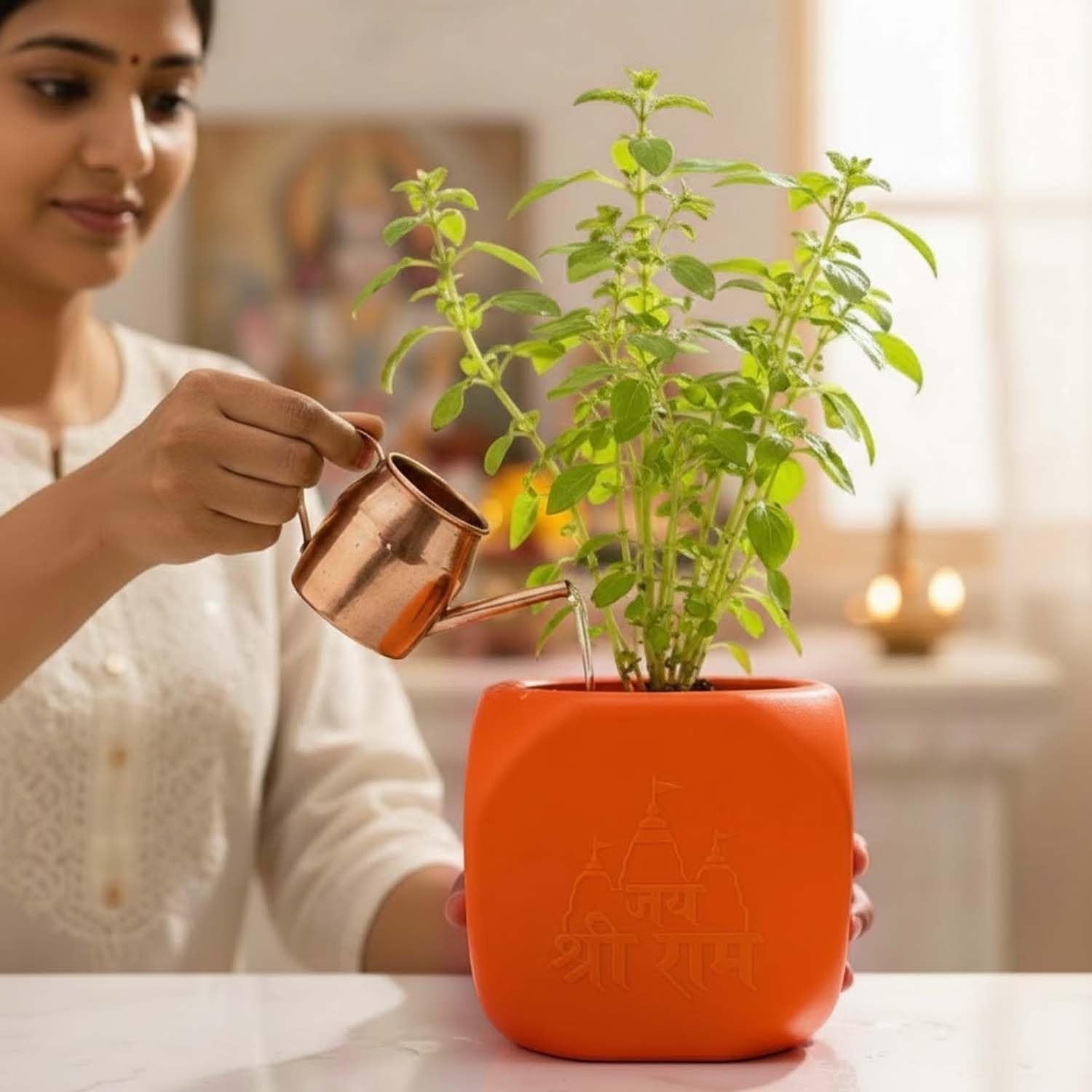 GoHooked orange square plastic Tulsi plant pot with Hindu religious symbols, perfect for home or pooja room.