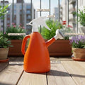 GoHooked orange 1L plastic watering can with spray bottle function and adjustable nozzle for indoor plants.