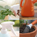 GoHooked orange plastic 1L watering can with shower head and spray bottle function for indoor plants.