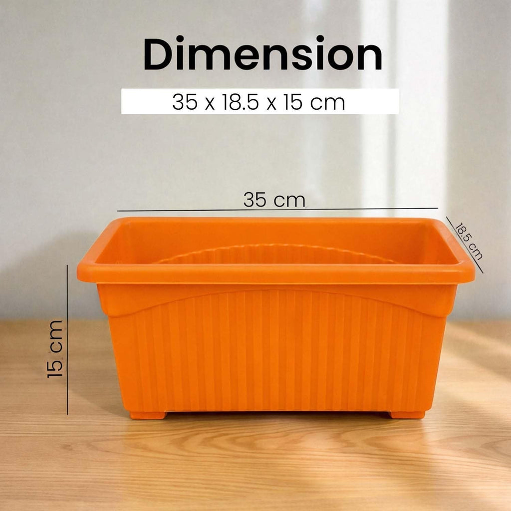 Go Hooked orange rectangular plastic plant pot, 35 x 18.5 x 15 cm, with ribbed texture and art deco style.