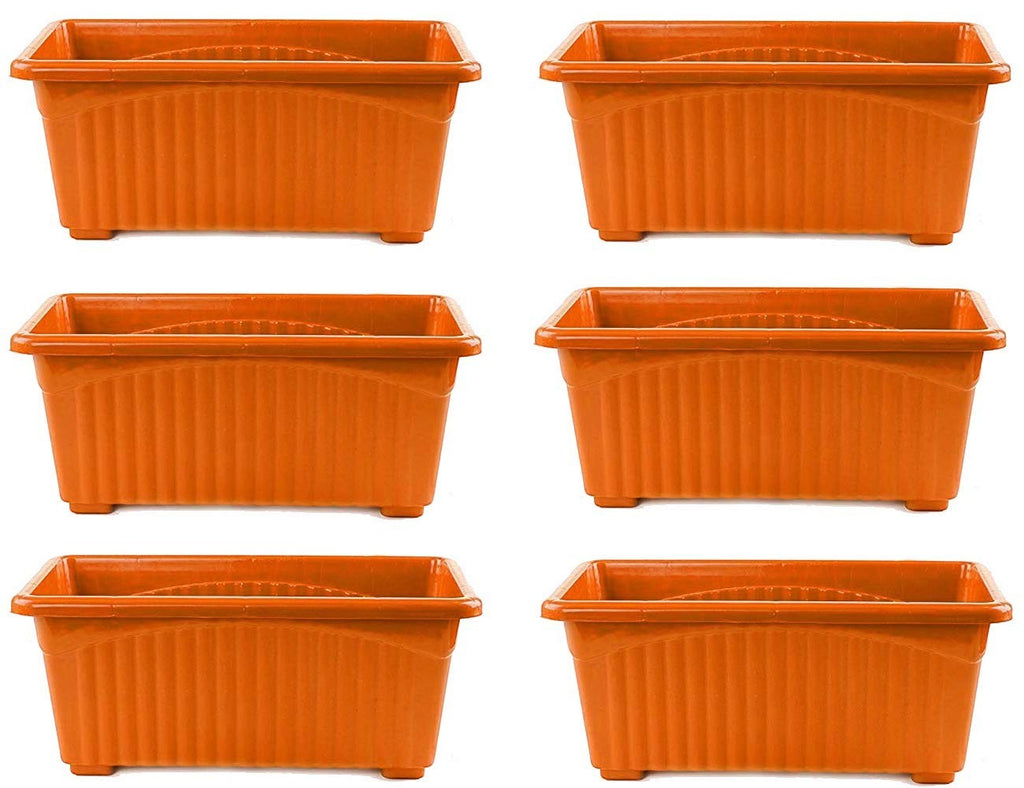 Go Hooked set of 6 orange rectangular plastic plant pots with ribbed texture and raised feet.