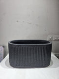 GoHooked 30-inch oval floor planter with a modern vertical ribbed texture in a dark grey speckled marble finish.