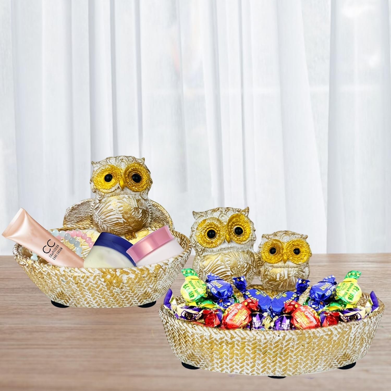 GoHooked set of 2 golden polyresin owl baskets, one holding makeup, the other holding candy.