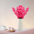 GoHooked pink artificial flowers in a white textured vase, realistic and low-maintenance home dcor.