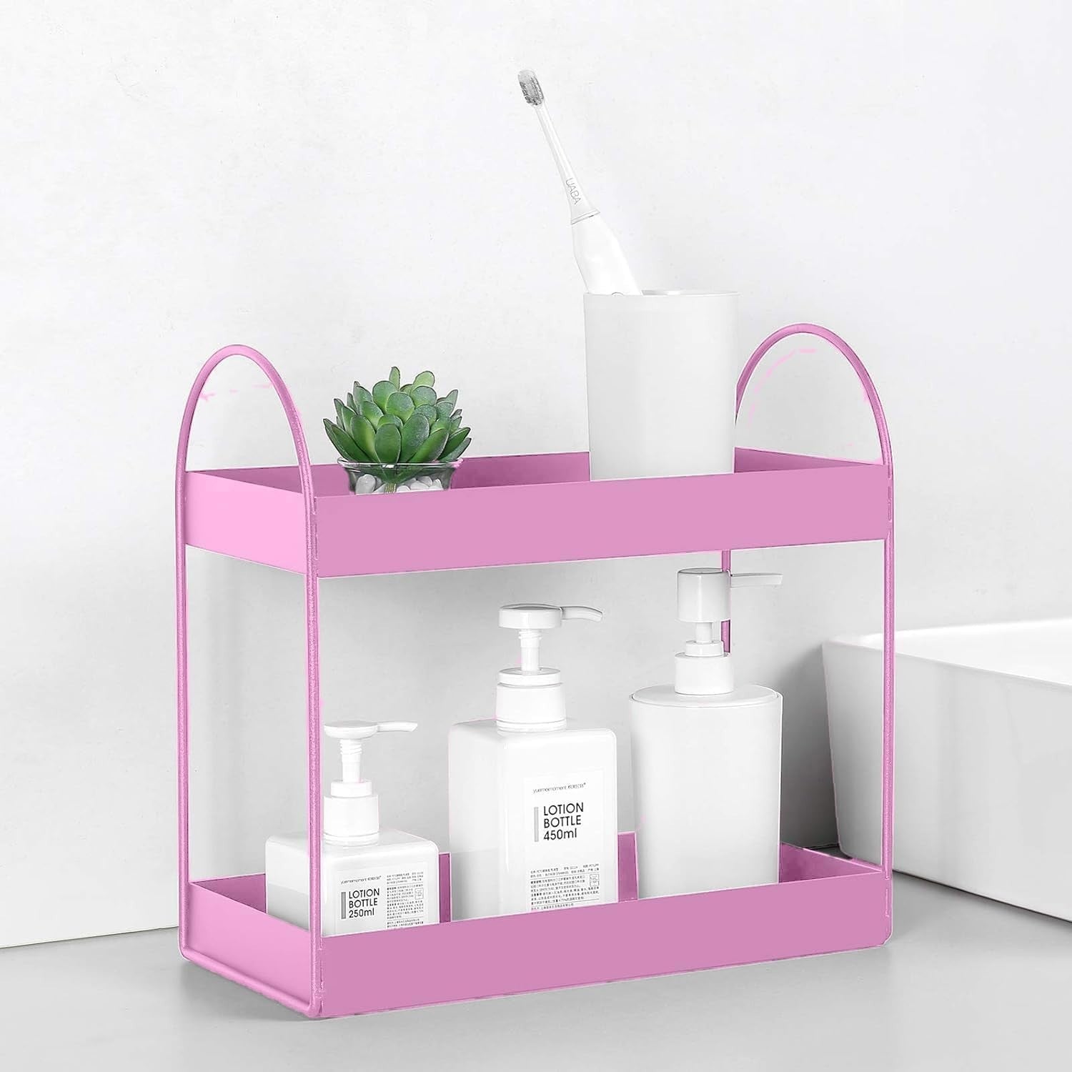 GoHooked pink metal 2-tier standing rack for bathroom or kitchen countertop organization. Holds lotions, cosmetics, and spices.