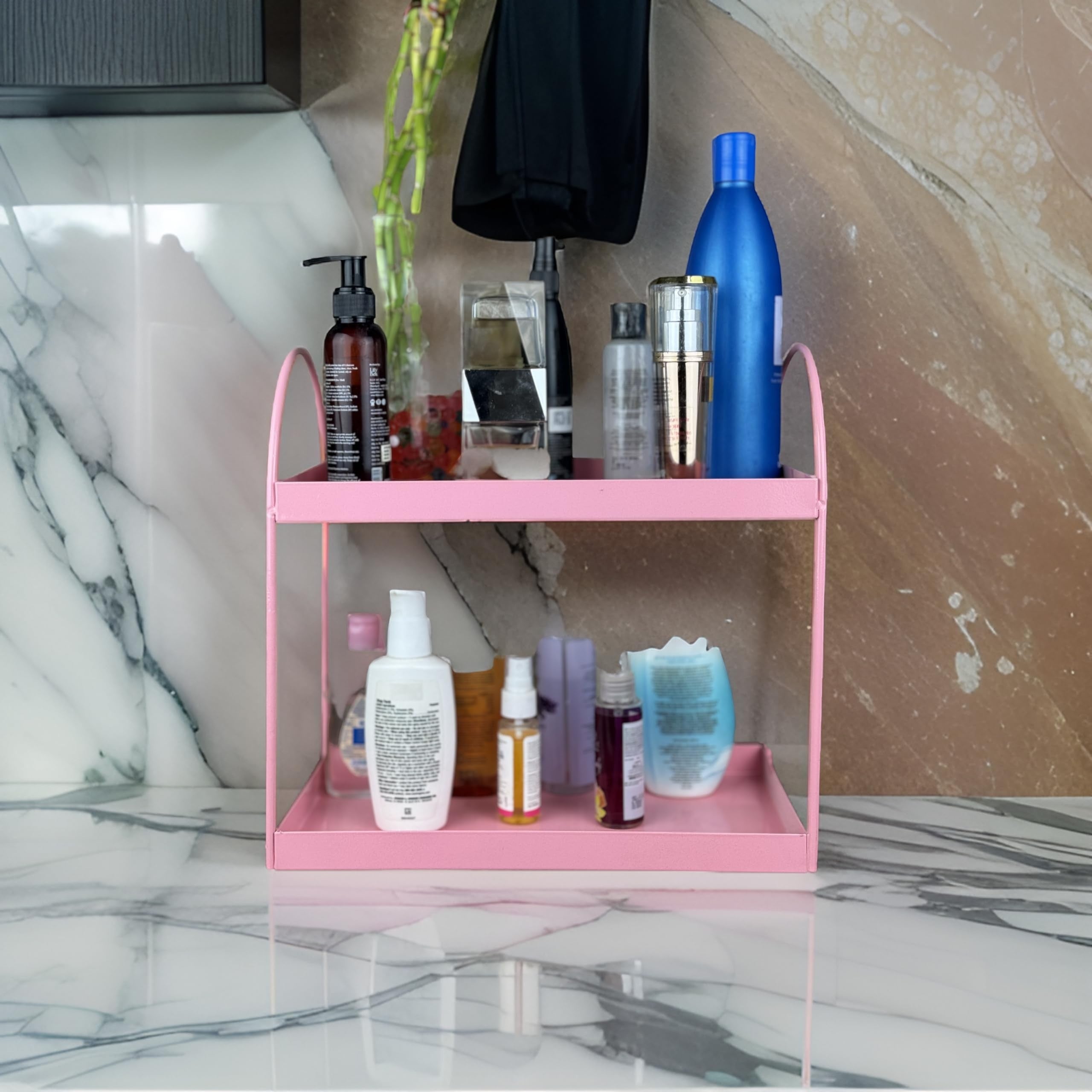 GoHooked pink metal 2-tier standing rack organizer for bathroom or kitchen countertop storage. Holds cosmetics, spices, and bottles.