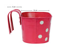 GoHooked pink metal hanging planter with white polka dots, 12 inch oval shape, perfect for railings.