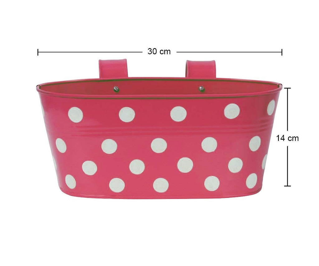 GoHooked pink metal railing planter with white polka dots, 12-inch oval, weatherproof, with detachable hooks.