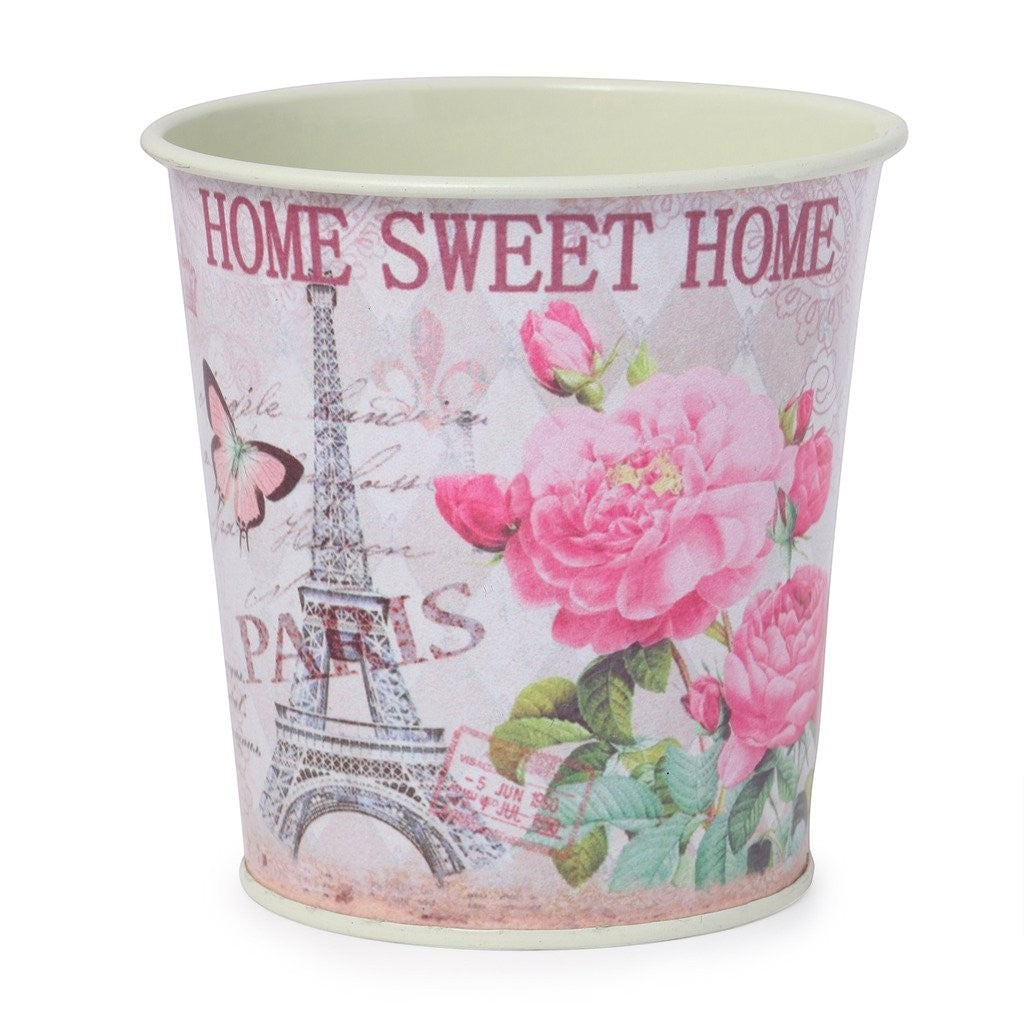 GoHooked pink metal planter with Eiffel Tower, roses, and butterfly design. Home Sweet Home text.