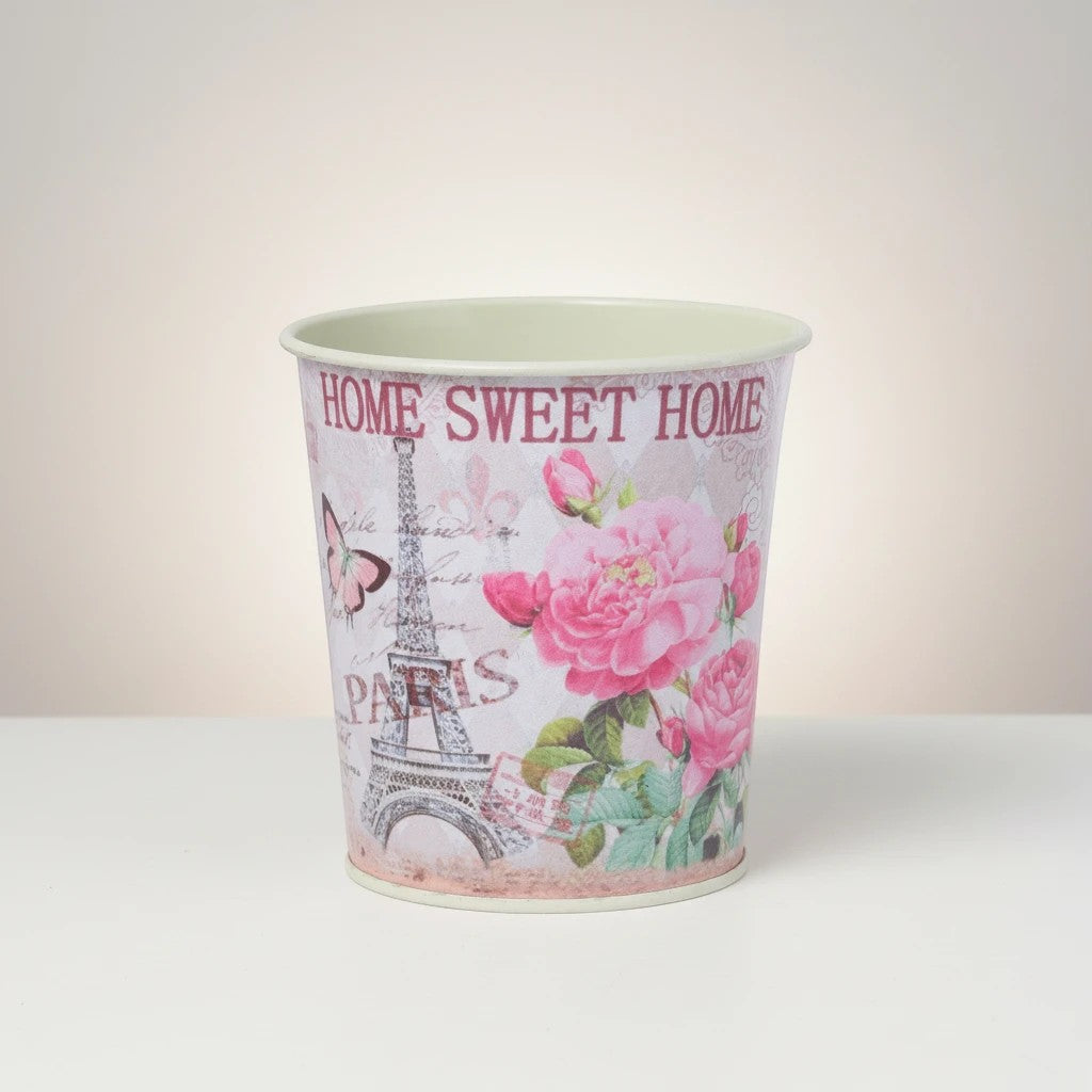 GoHooked pink metal planter with Eiffel Tower, roses, and butterfly design. Home Sweet Home text.