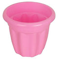 GoHooked pink plastic garden planter with a fluted design, suitable for indoor or outdoor home plant displays.