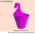 GoHooked pink plastic hanging planter with hook for railings, balconies, and vertical gardens. 22cm diameter.