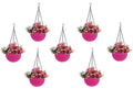 GoHooked pink plastic hanging planter with woven texture, filled with pink and purple flowers.