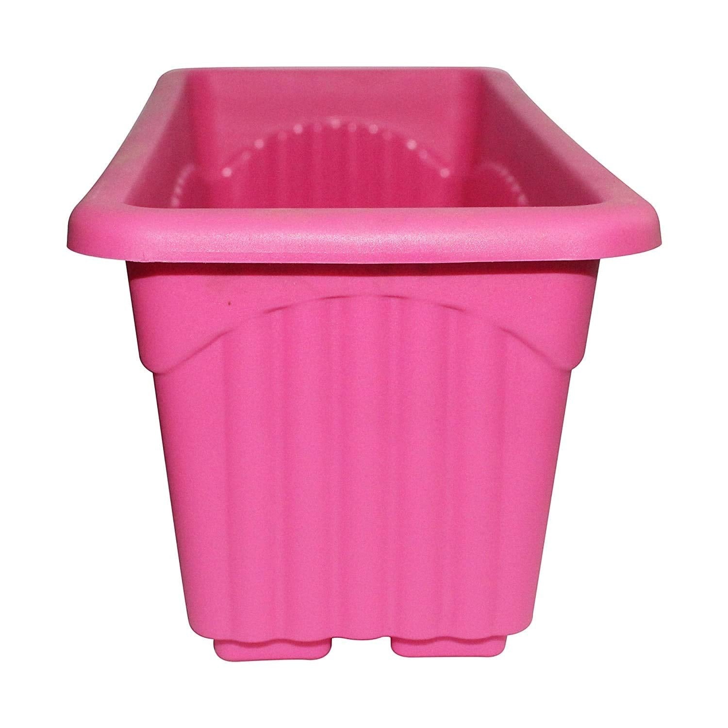 GoHooked rectangular plastic plant pot, bright pink, with ribbed texture and drainage feet. Ideal for home or garden.