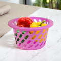 GoHooked pink plastic storage net basket with open weave design, holding red and yellow bell peppers.