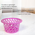 GoHooked pink plastic mesh storage basket with open weave design and wide rim. Multipurpose for home use.