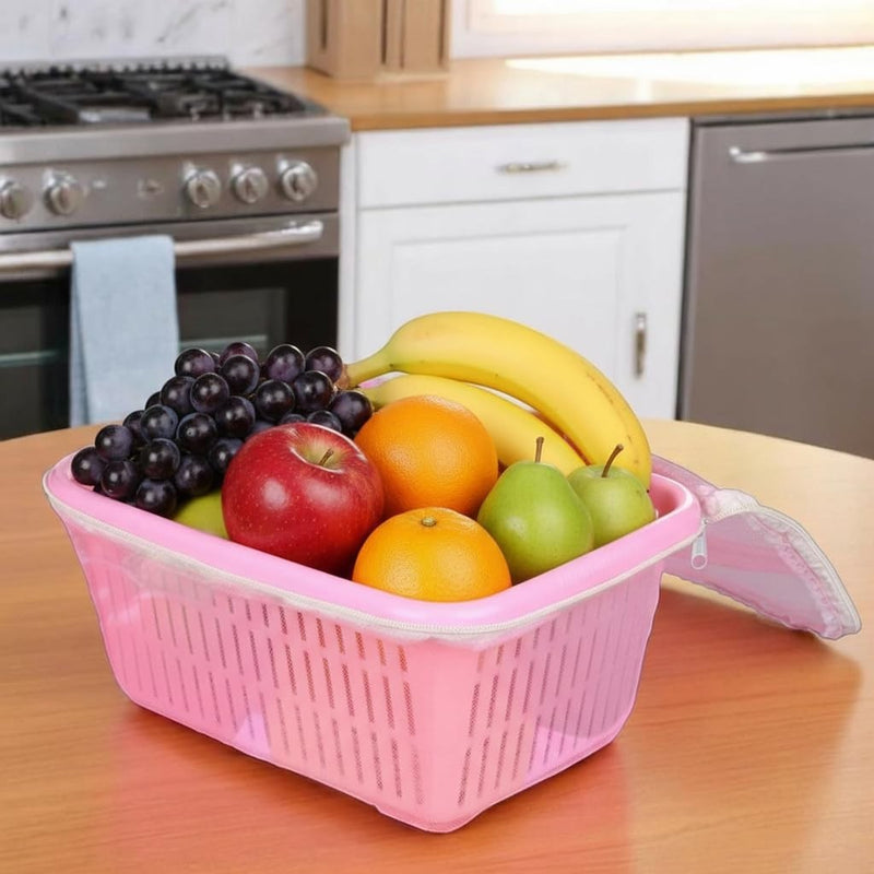 GoHooked pink plastic storage basket with zip net cover filled with grapes, apple, oranges, bananas, and pears.