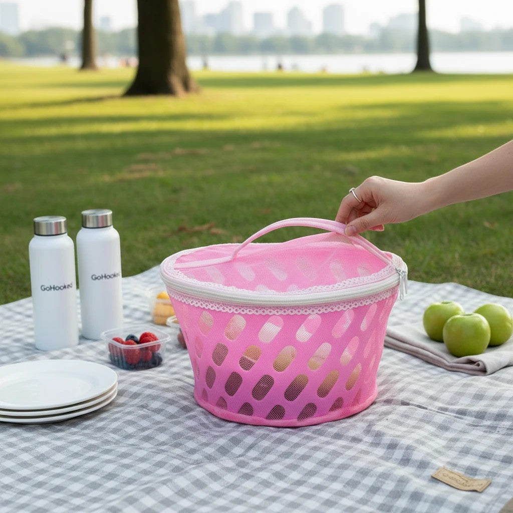 Go Hooked pink plastic storage basket with zip net cover, ideal for picnics and food storage.
