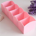 GoHooked pink plastic 5-grid drawer organizer for socks, underwear, and small items. Scalloped edges.