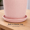 GoHooked pink plastic tower pot with built-in saucer tray, 18 inches tall, perfect for indoor/outdoor use.