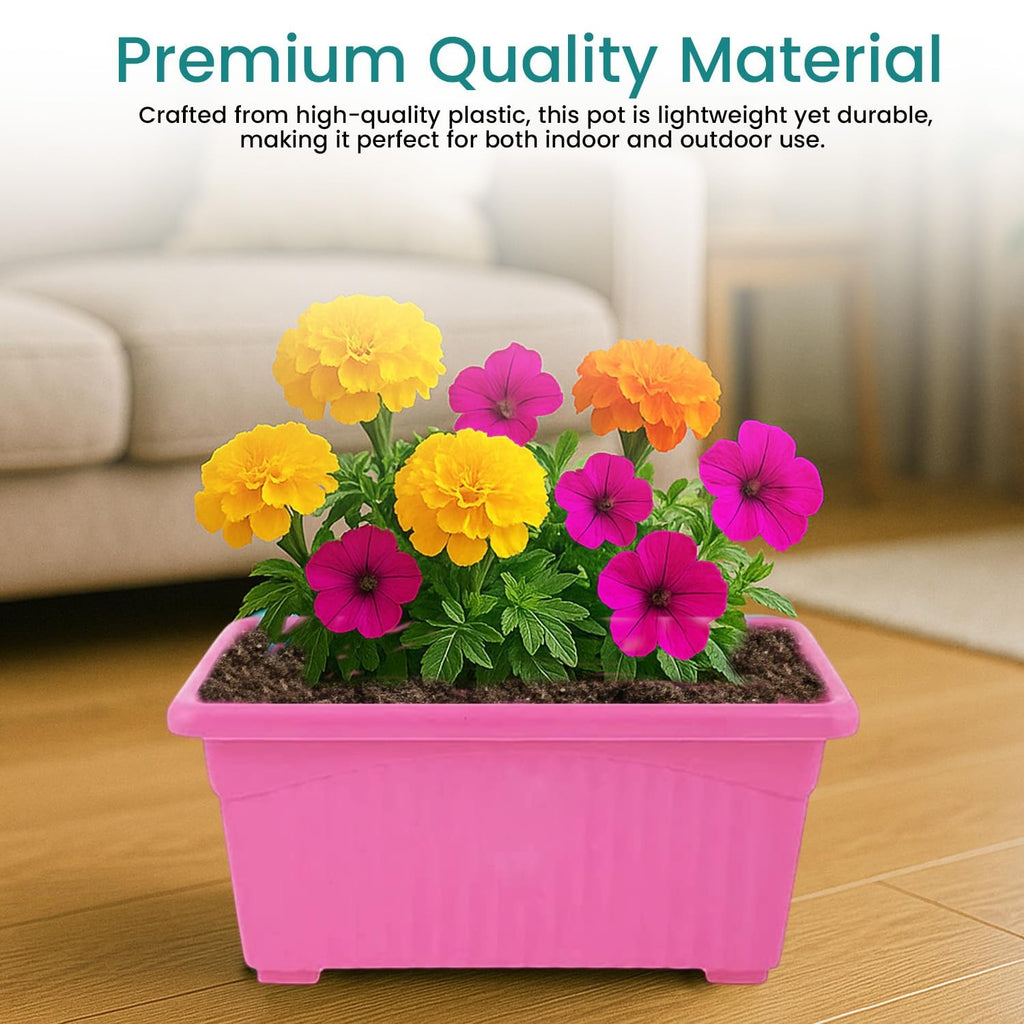GoHooked pink rectangular plastic plant pot with yellow, pink, and orange flowers. Durable for indoor/outdoor use.