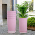 Go Hooked pack of 6 pink 18-inch tower planters with saucers. Lightweight, durable, and weather-resistant with drainage holes.