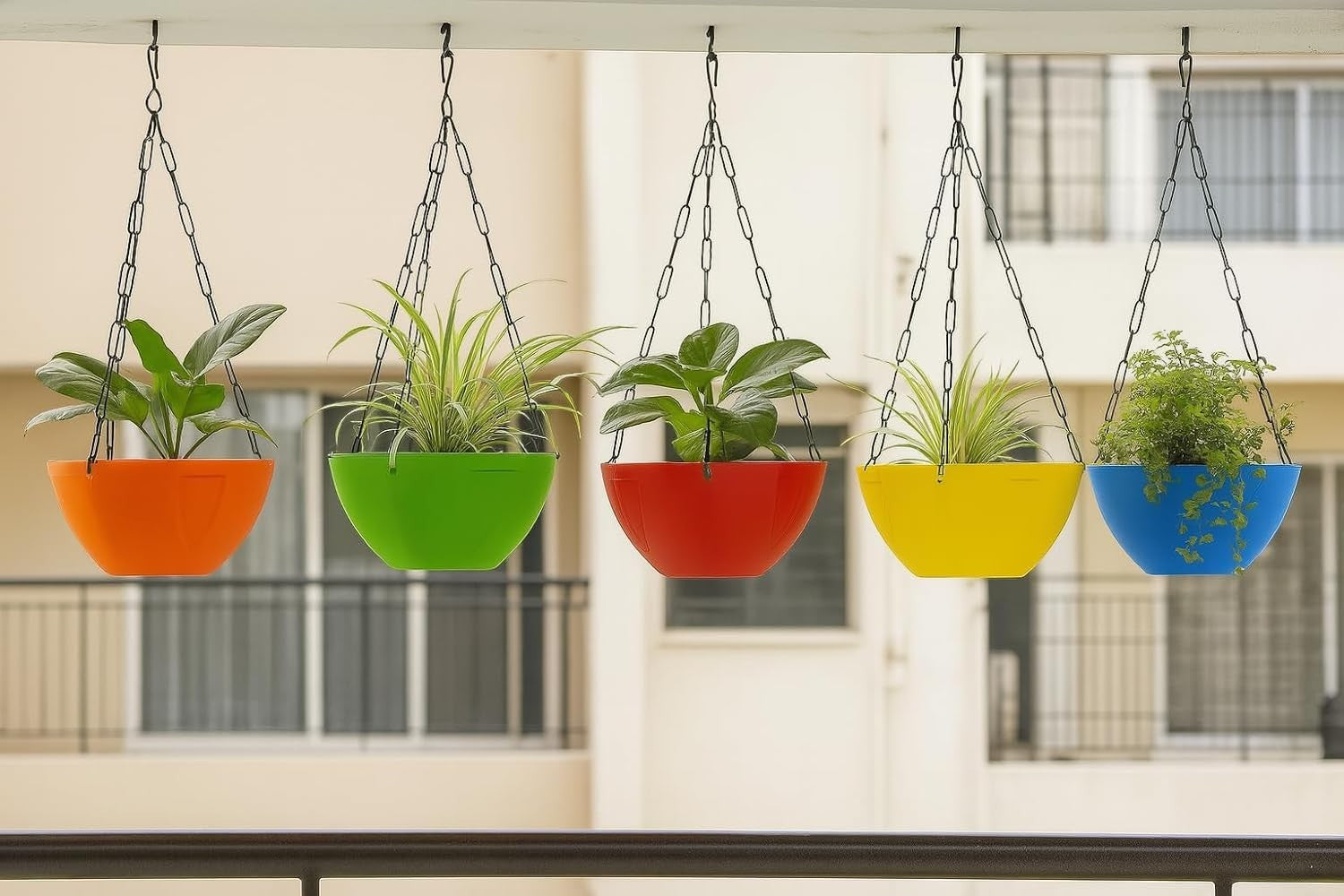 GoHooked set of 5 multicolor plastic hanging planters with chains, ideal for indoor/outdoor use.