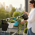 GoHooked multicolour plastic hanging planters with double hooks, set of 3, on a balcony railing.