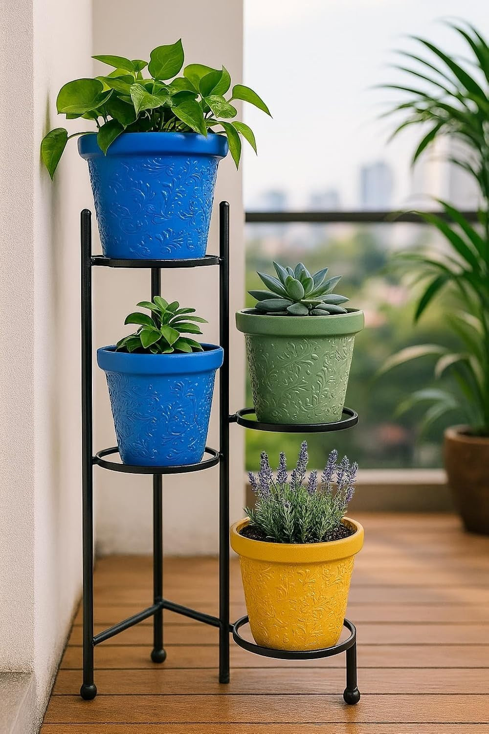 GoHooked set of 4 multicolor plastic planter pots with embossed floral design on a black tiered stand.