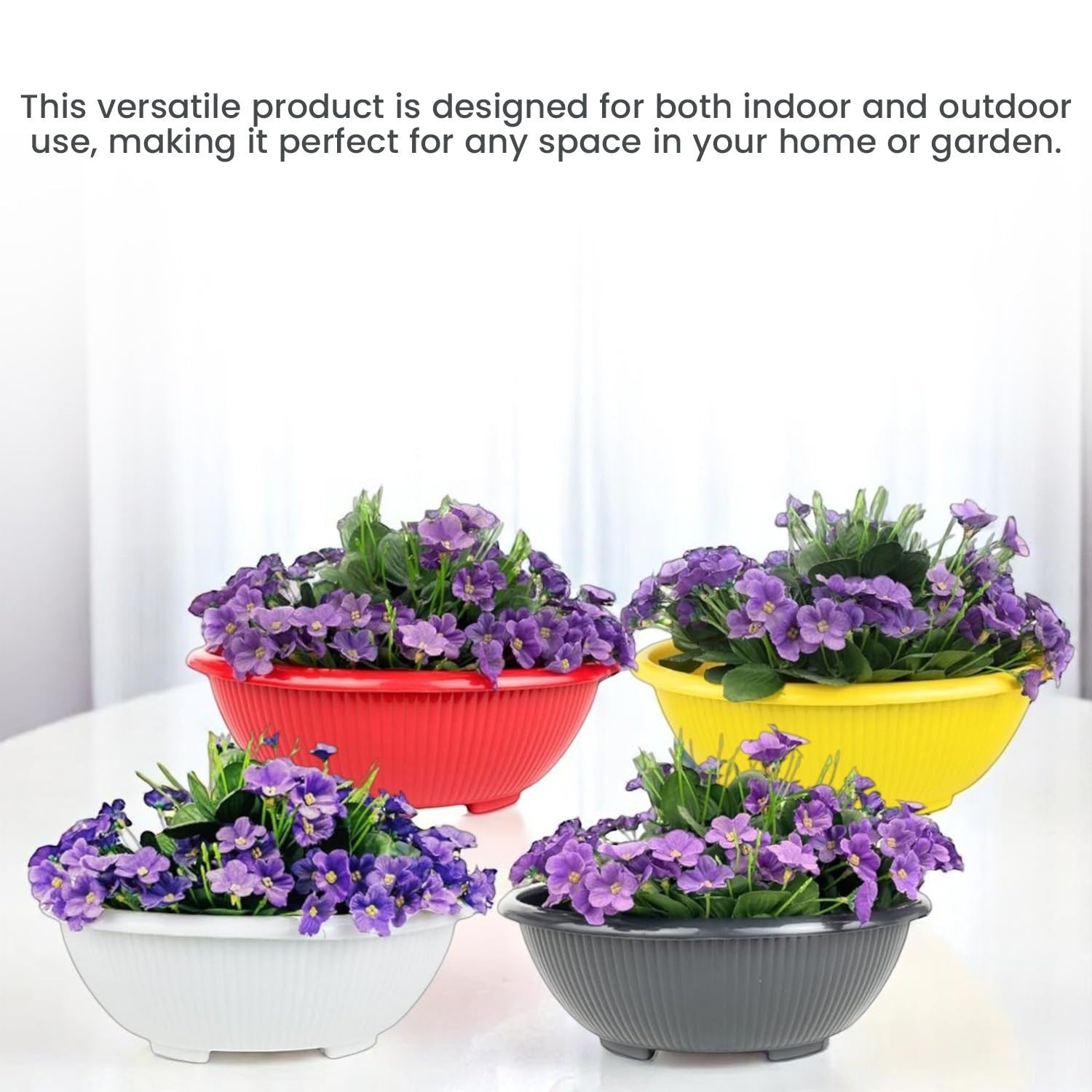 Go Hooked set of 4 multicolor plastic planter pots with purple flowers. Modern design, lightweight and durable for indoor/outdoor use.