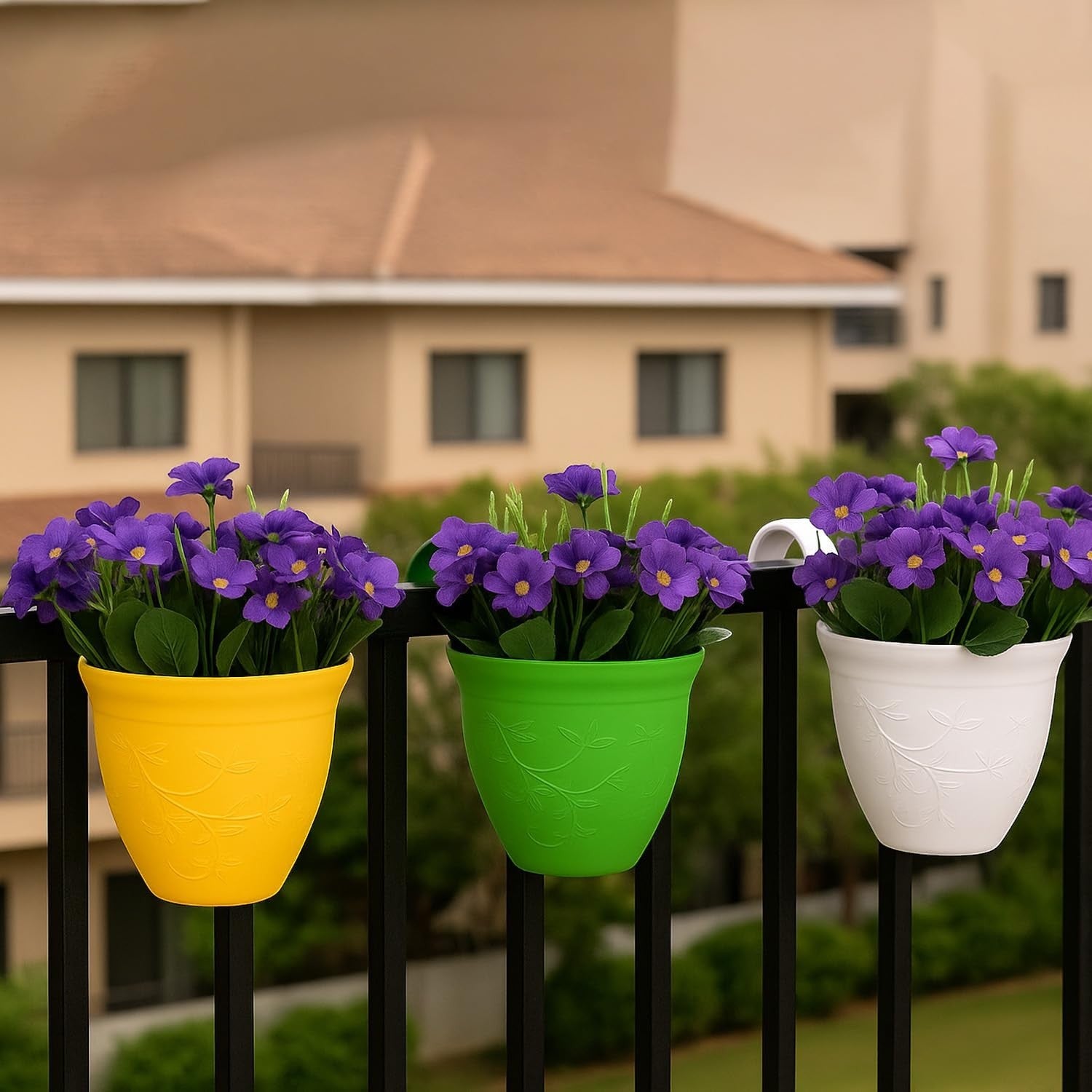 GoHooked set of 3 multicolor plastic railing planters with purple flowers. Lightweight, UV resistant, and unbreakable.